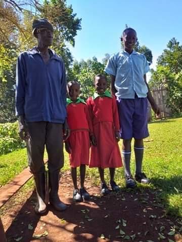 MATARA and 3 of his orphans The other 2 girls were sick in bed